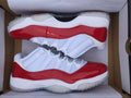 Air Jordan 11 Low Sneakers White Red - product image from the listing.