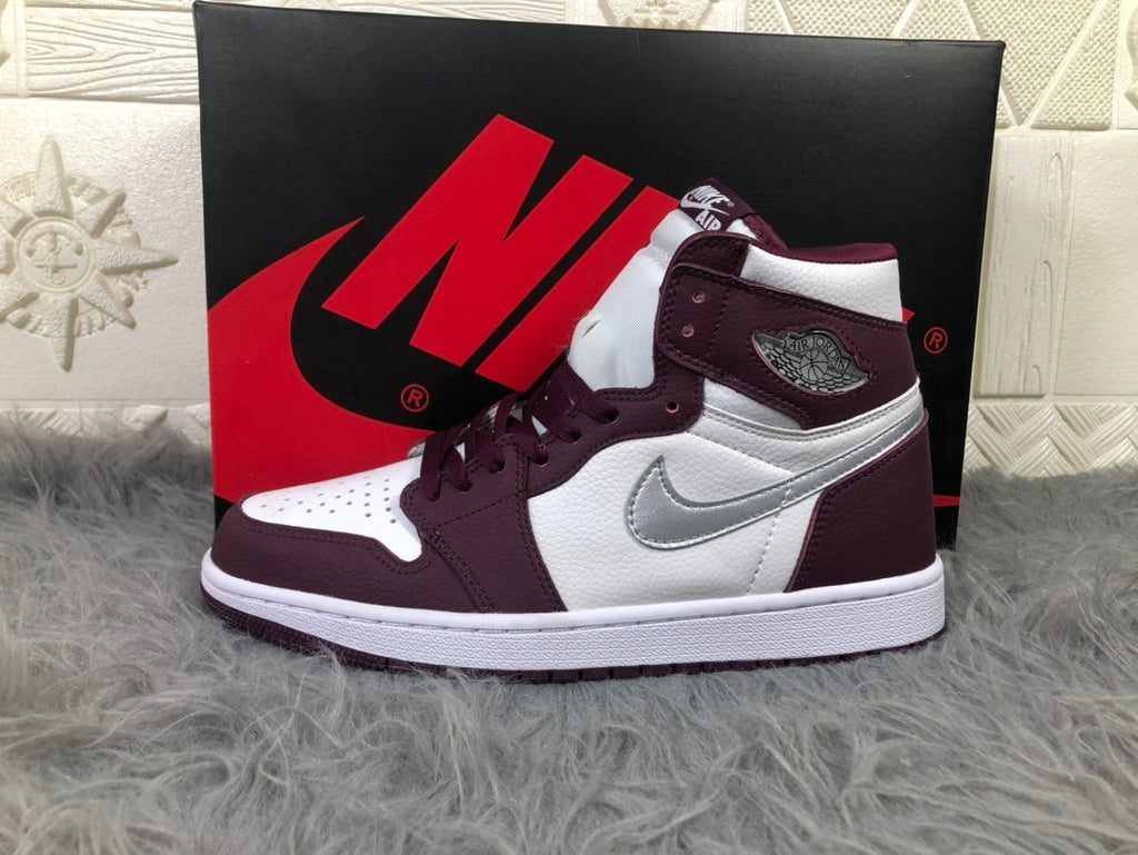 Nike Air Jordan 1 Retro High OG Sneakers in Bordeaux 555088-611 - product image from the listing.