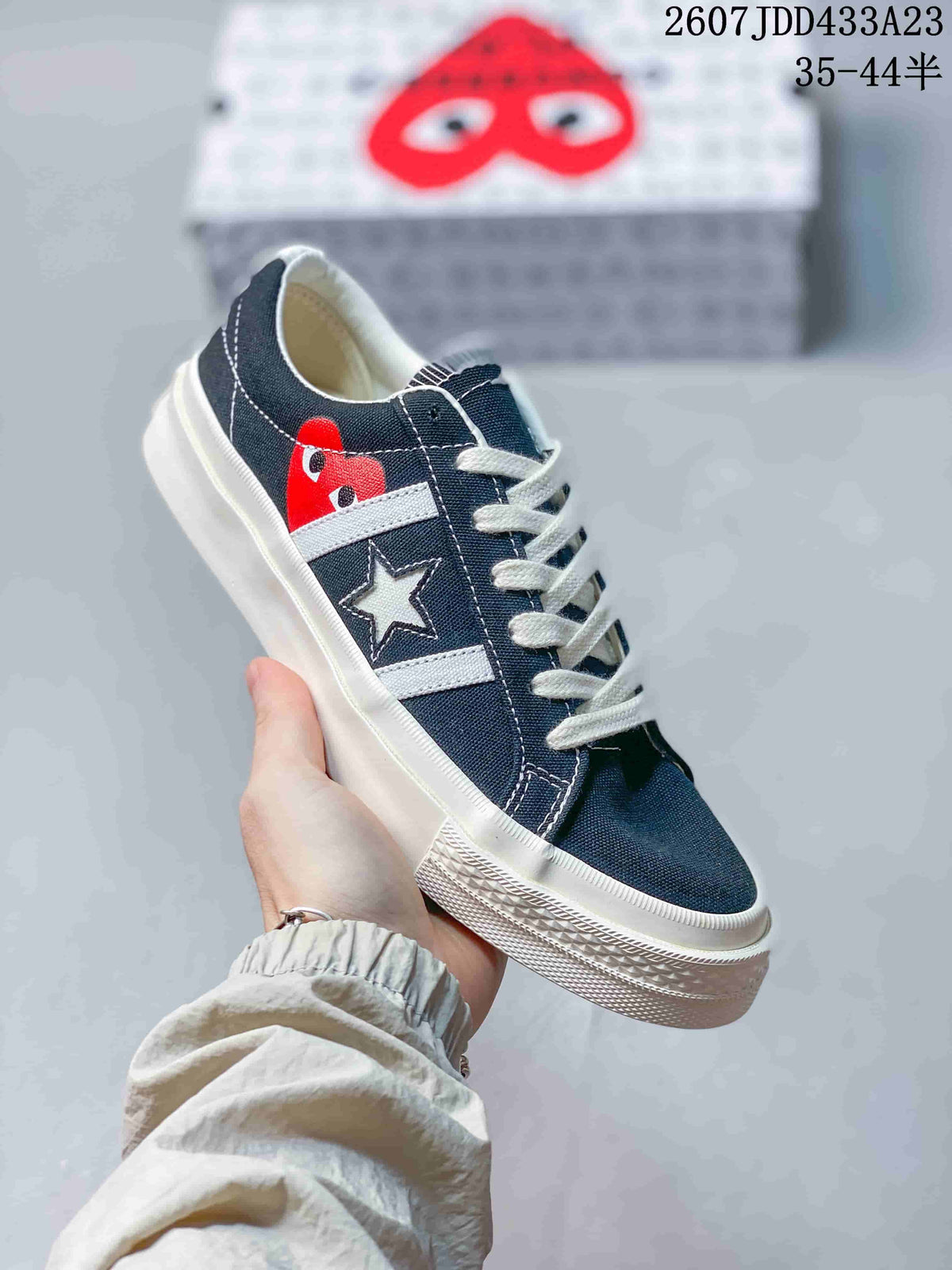 CDG Play x Converse One Star Academy Pro Sneakers in Navy White - product image from the listing.