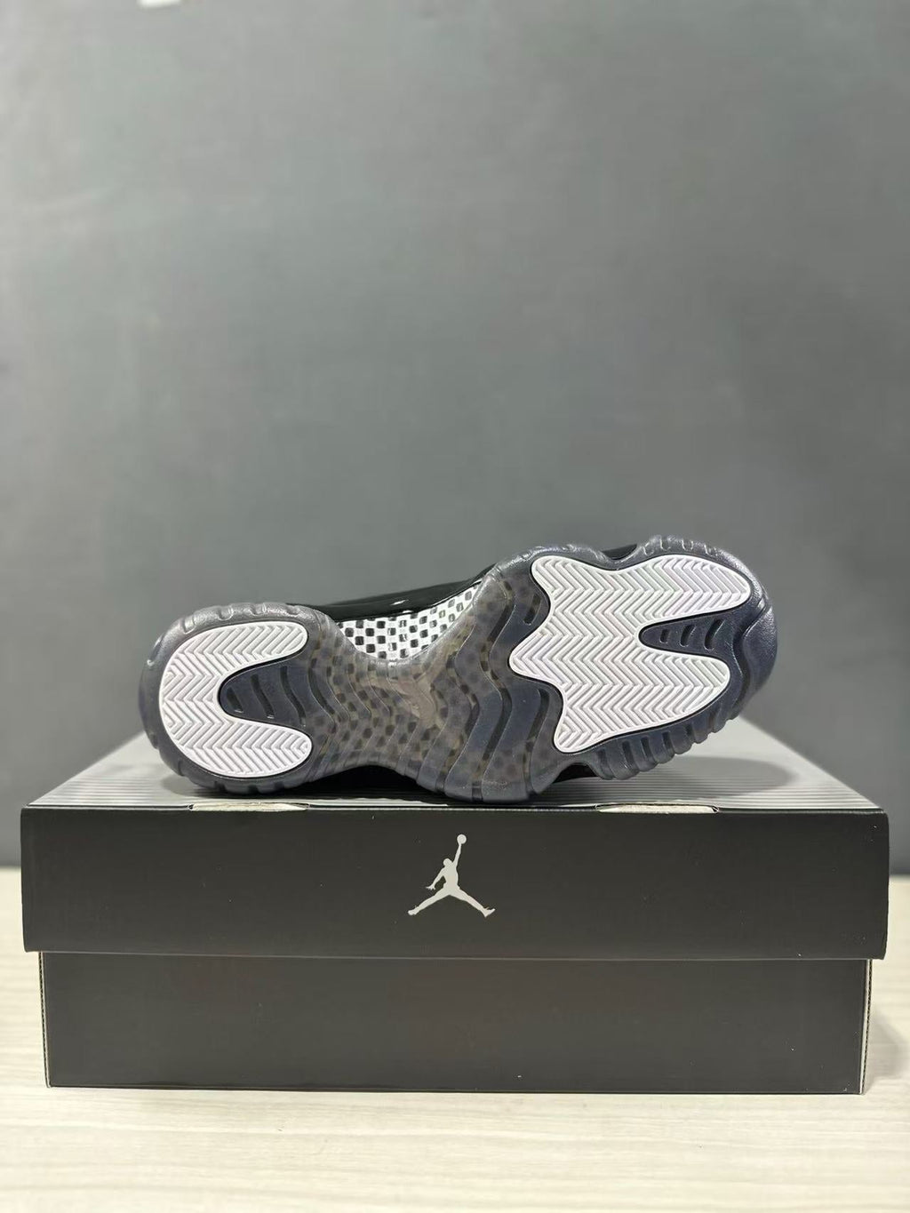 Comme des Garçons × Jordan Air Jordan 11 Sneakers in Black - product image from the listing.