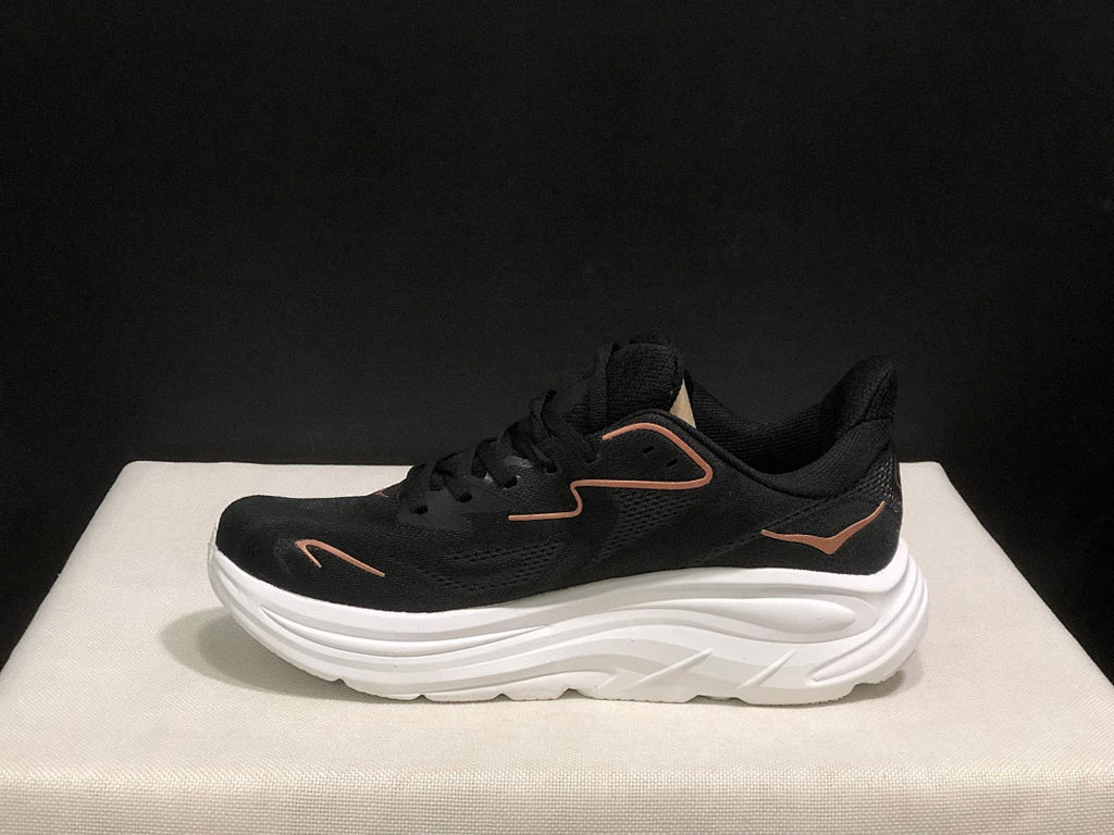 HOKA Clifton 10 Running Shoes, in Black and White - product image from the listing.