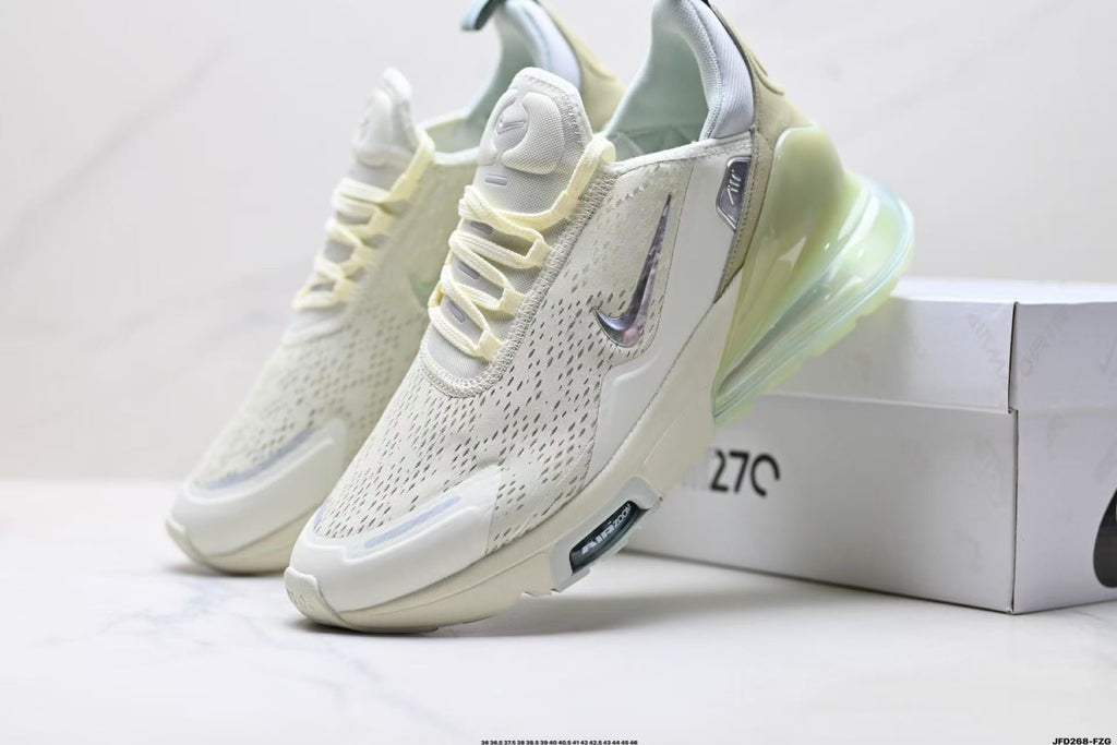 Light Green and White Nike Air Zoom Sneakers - product image from the listing.