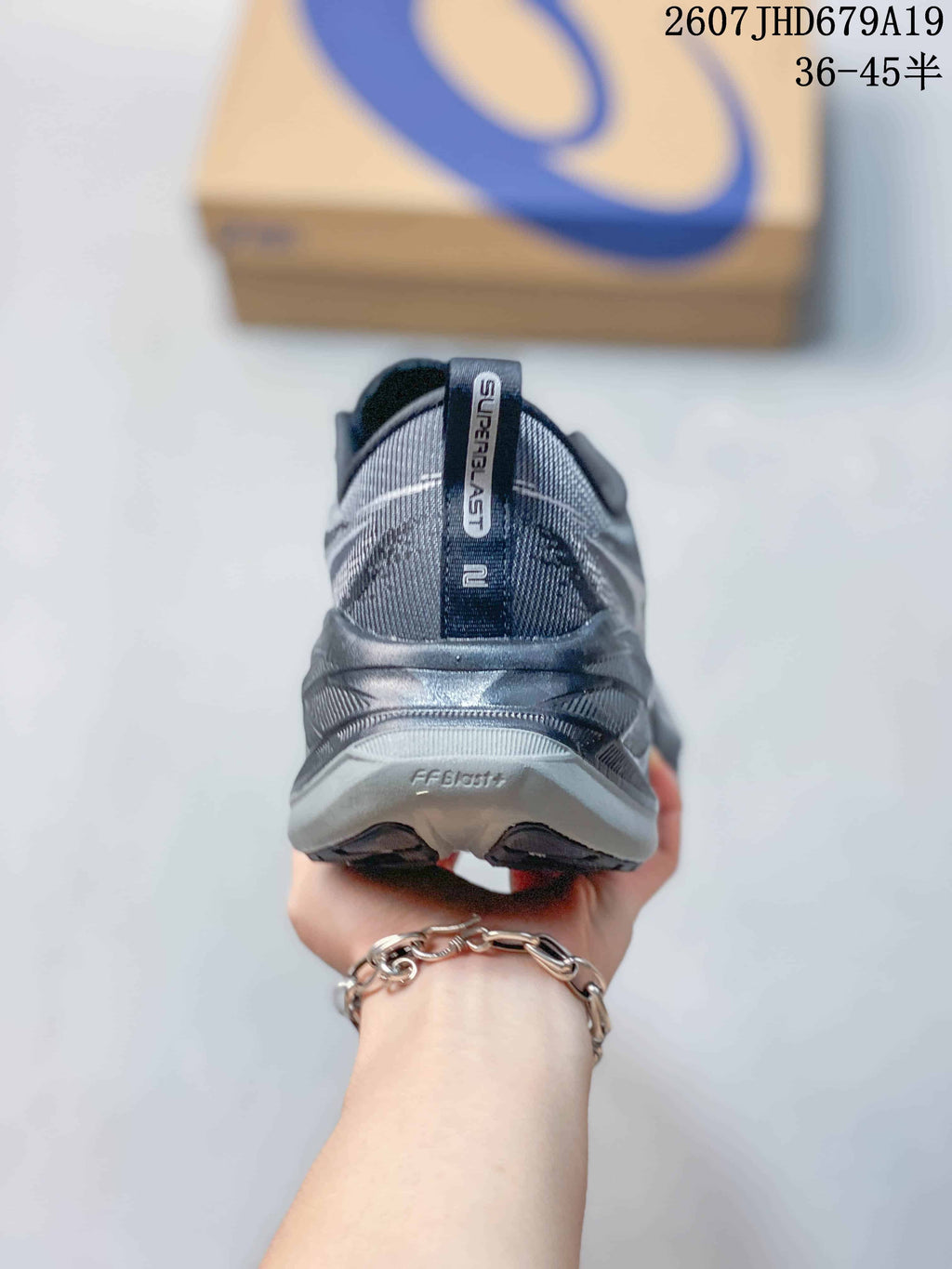 ASICS Superblast 2 Paris Running Sneakers in Gray - product image from the listing.