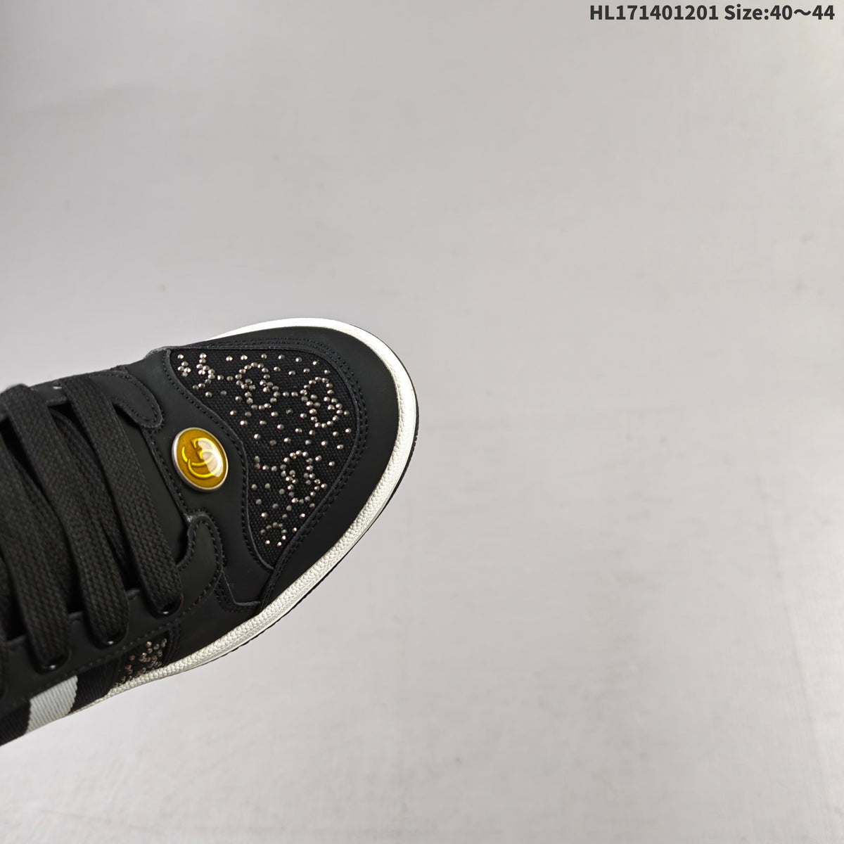 Gucci Crystal-Embellished Low-Top Sneakers in Black HL171401201 - product image from the listing.