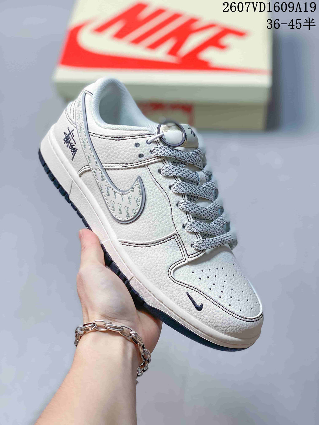 Nike Dunk Low Retro Custom Sneakers in White and Navy - product image from the listing.