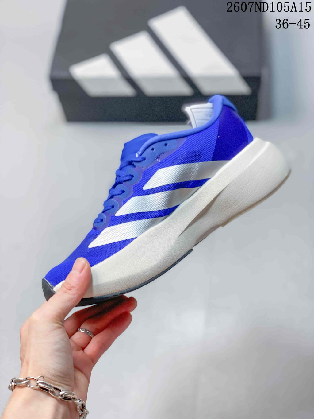 Adidas Adizero Evo SL Running Sneakers in Blue White 2607ND105A15 - product image from the listing.
