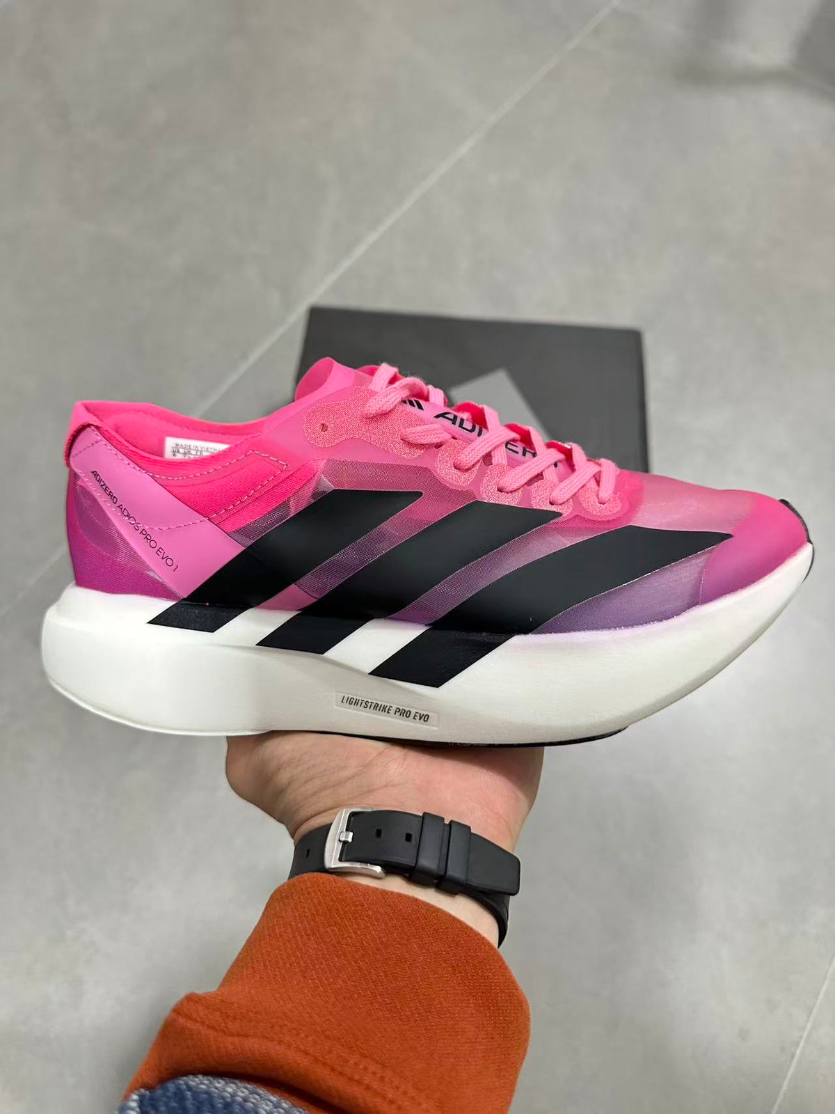 Pink adidas Lightstrike Pro Evo Running Shoes - product image from the listing.