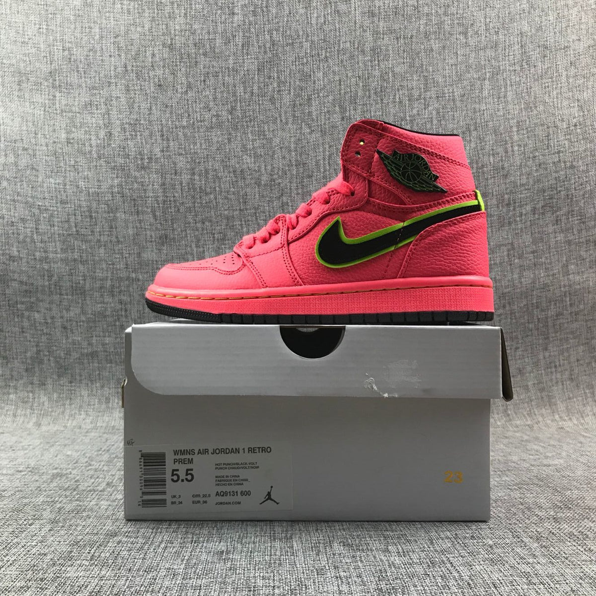 Pink and Black Air Jordan 1 Mid Sneakers AQ9131-600 - product image from the listing.