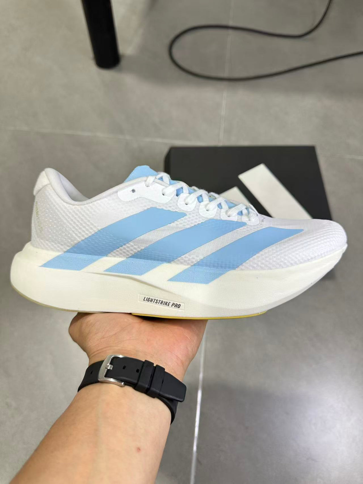 Adidas Lightstrike Pro Running Shoes in White Blue JQ4527 - product image from the listing.