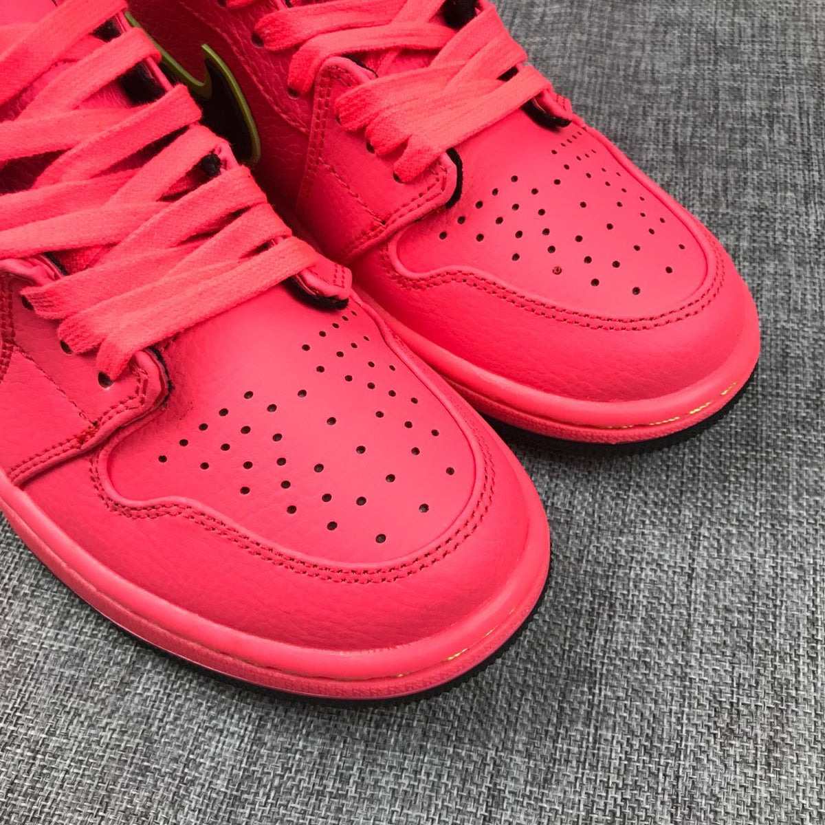 Pink and Black Air Jordan 1 Mid Sneakers AQ9131-600 - product image from the listing.