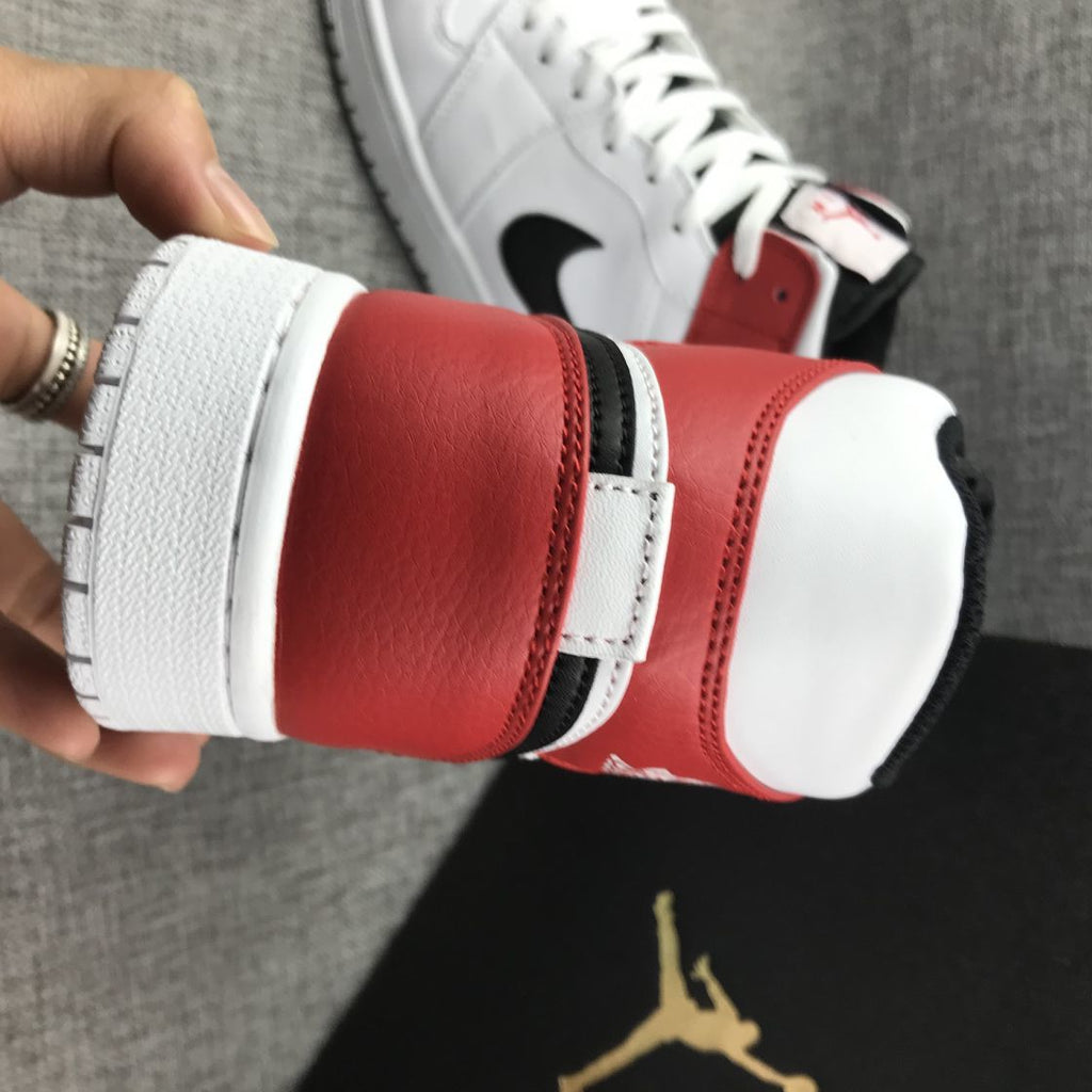 Air Jordan 1 Mid Sneakers in White Red 554724-116 - product image from the listing.