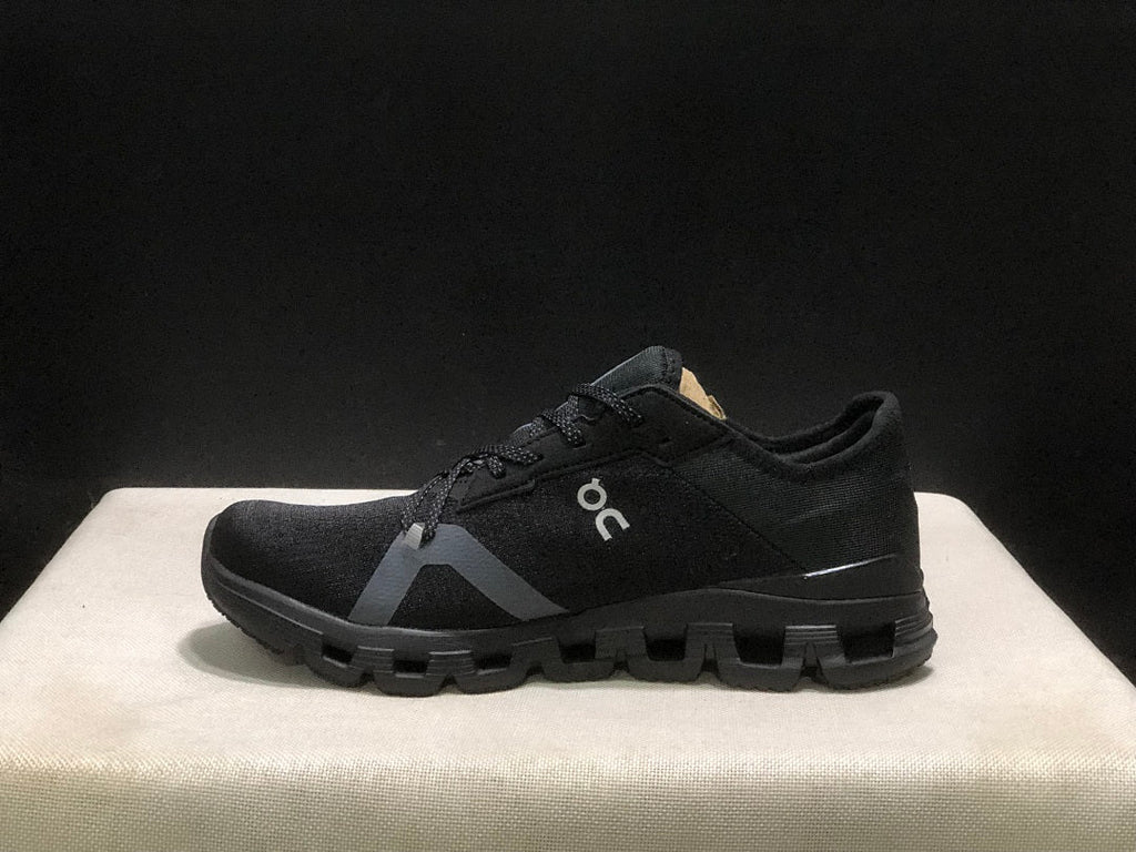 On Cloud X 4 AD Sneakers in Black - product image from the listing.