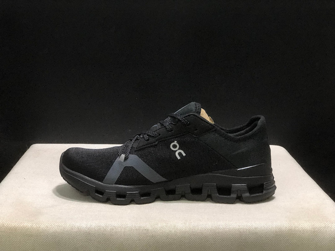 On Cloud X 4 AD Sneakers in Black - product image from the listing.