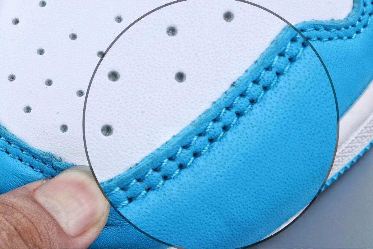 UNC Blue and White Sneakers 401 - Jordan 1 Low SB - product image from the listing.