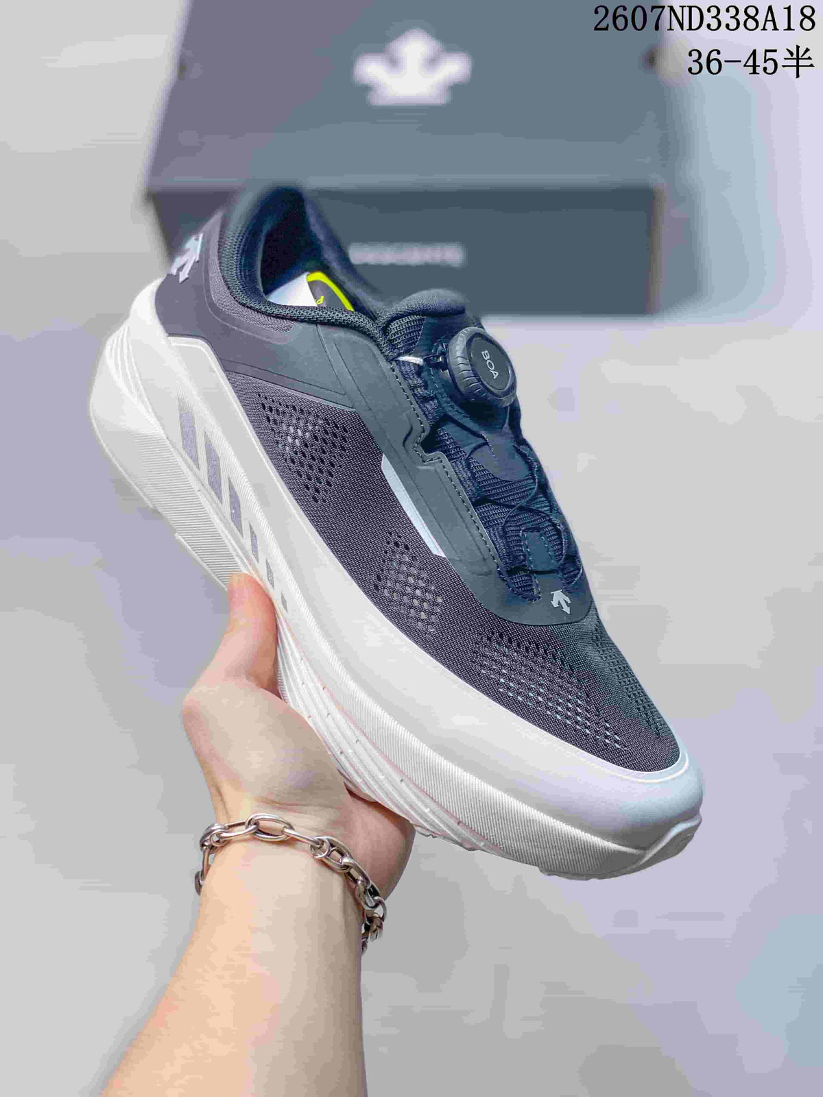 White and Black Descente D.F. Wire 3.0 Sneakers - product image from the listing.