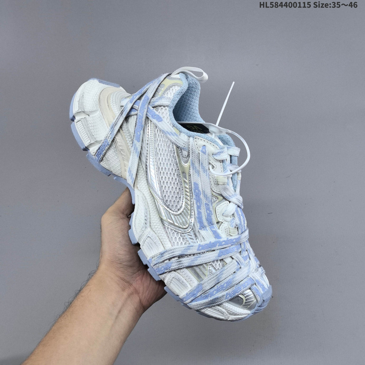 Balenciaga Phantom Trainers in White and Light Blue, Style 825597 - product image from the listing.