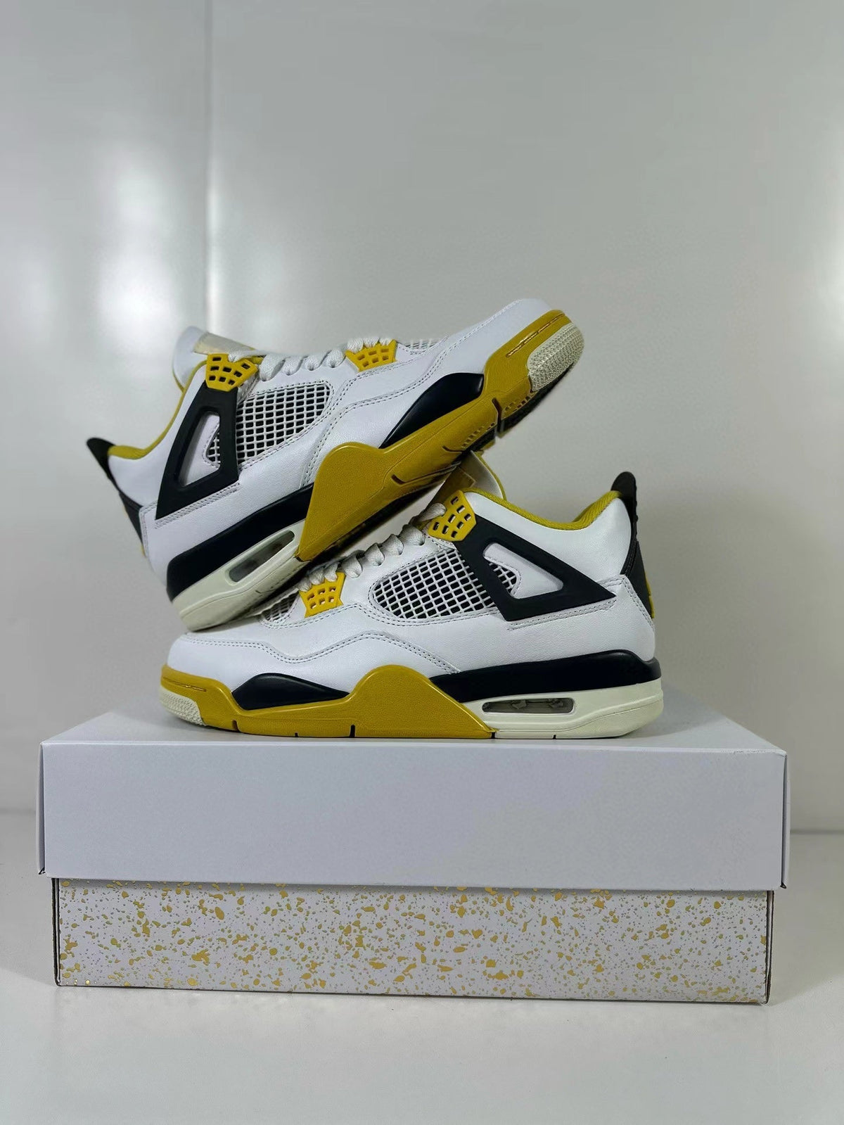 Air Jordan 4 Vivid Sulfur Sneakers White Yellow AQ9129-101 - product image from the listing.