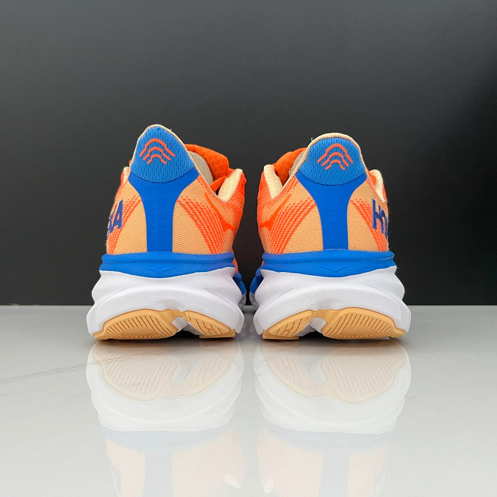 HOKA Clifton 9 Running Shoes, in Orange and Blue - product image from the listing.