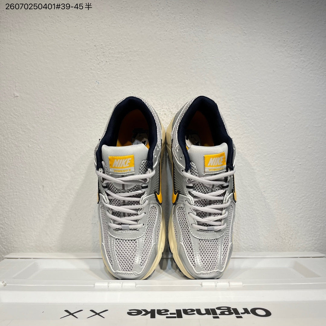 Nike Air Zoom Vomero 5 Running Shoes in White Grey Yellow - product image from the listing.