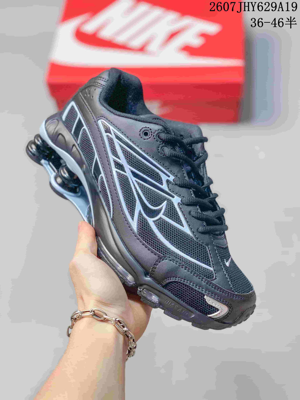 Nike Shox Ride 2 Sneakers in Black or in White - product image from the listing.