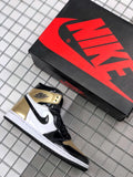 Air Jordan 1 High Gold Toe Sneakers in Black and Gold - product image from the listing.