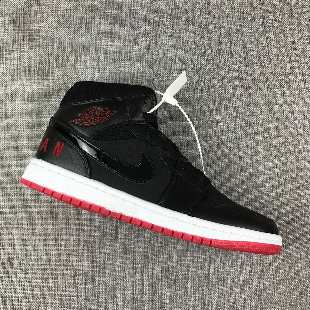 Air Jordan 1 Mid High-Top Sneakers in Black Red White - product image from the listing.