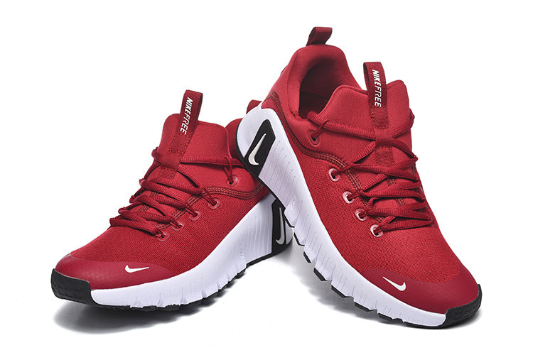 Nike Free Low-Top Sneakers in Red - product image from the listing.