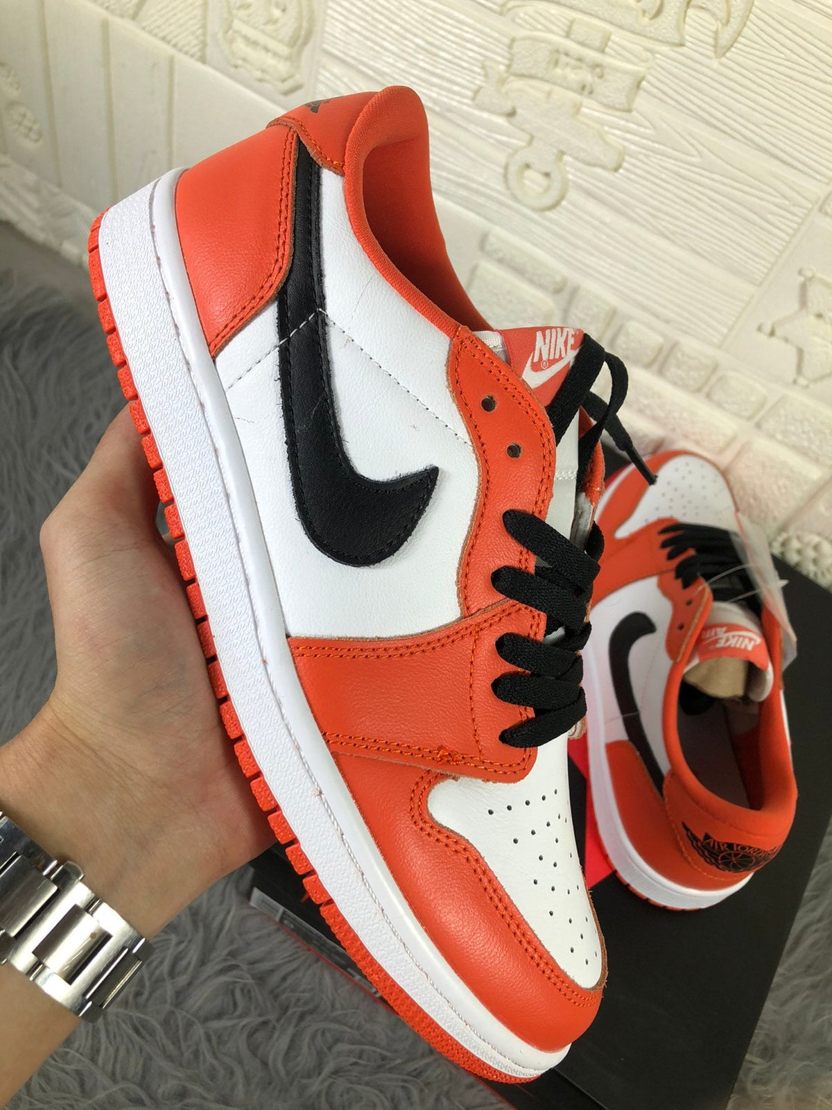 Nike Air Jordan 1 Low Sneakers in White Orange CZ0790-801 - product image from the listing.
