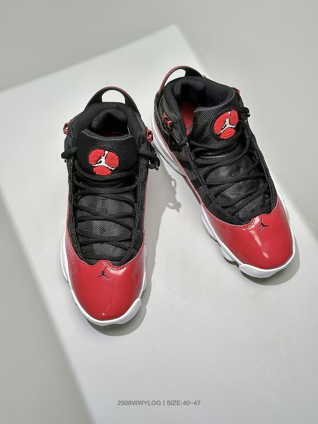 Jordan Six Rings 6-2 Sneakers in Black and Red - product image from the listing.