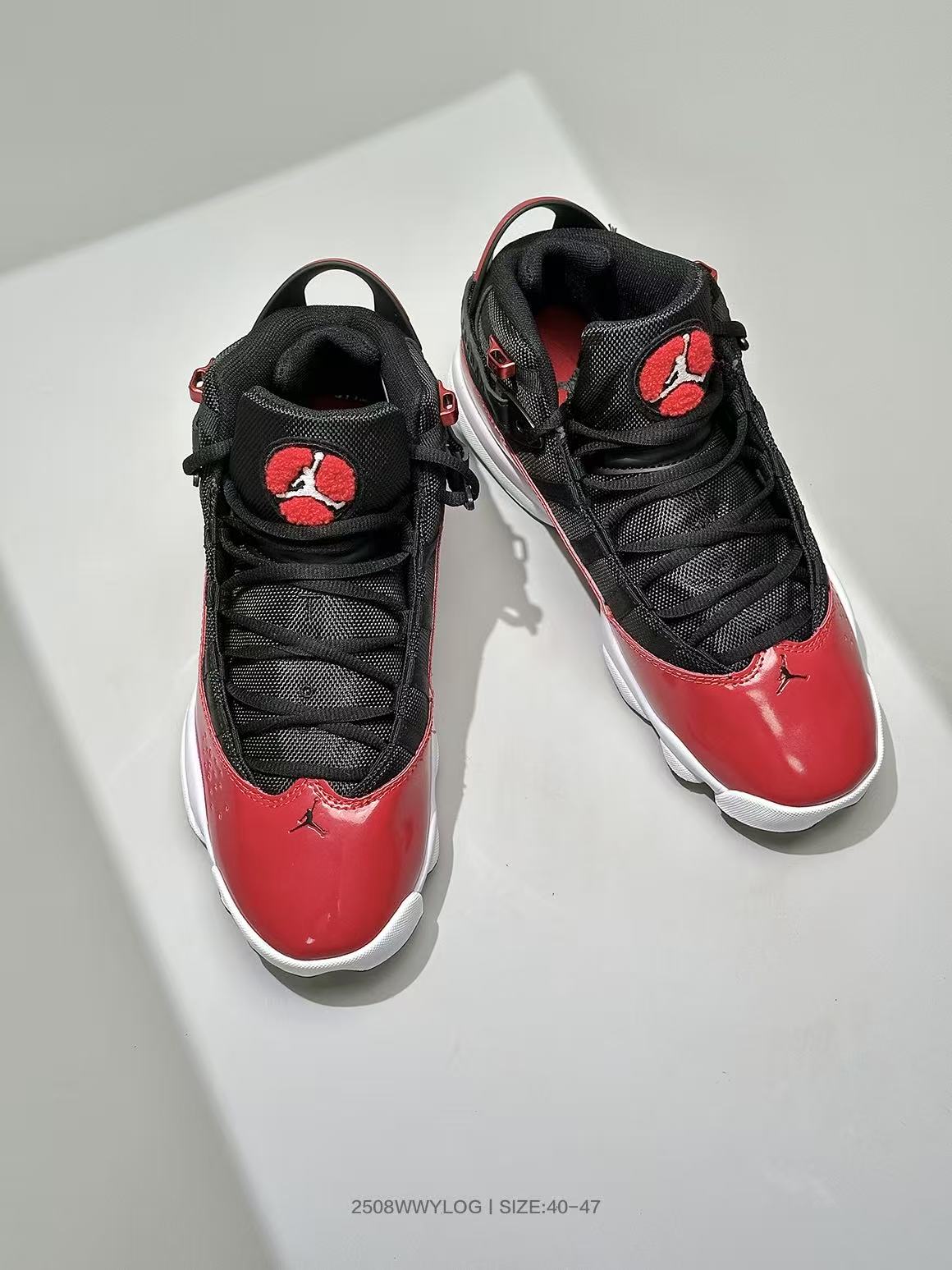 Jordan Six Rings 6-2 Sneakers in Black and Red - product image from the listing.