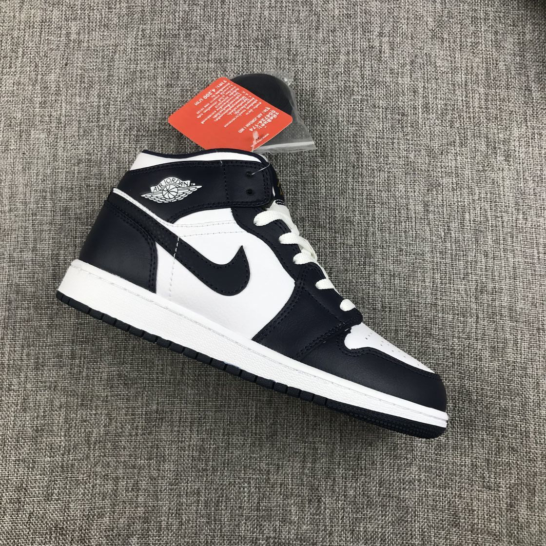 What The Obsidian Sneakers - Jordan 1 Mid 554724-174 - product image from the listing.