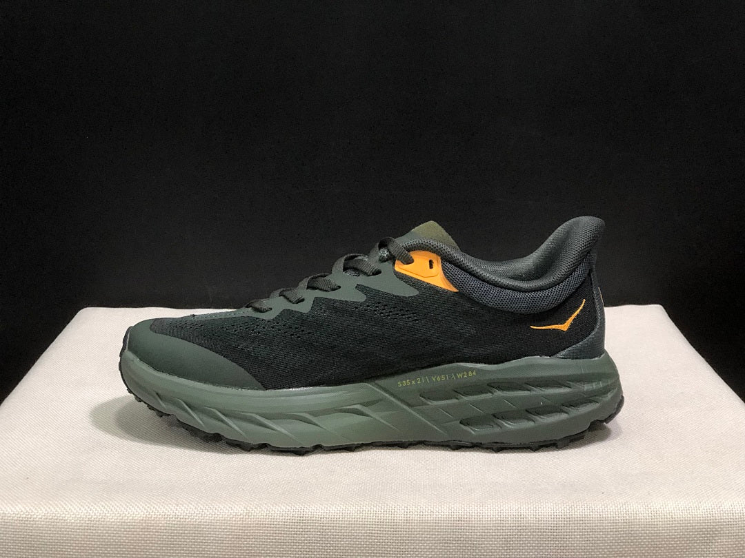 HOKA Speedgoat 5 Trail Running Shoes, in Black and Olive - product image from the listing.