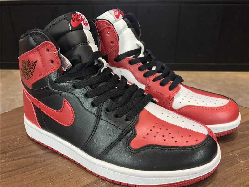 Air Jordan 1 High OG Sneakers in Black, Red and White - product image from the listing.
