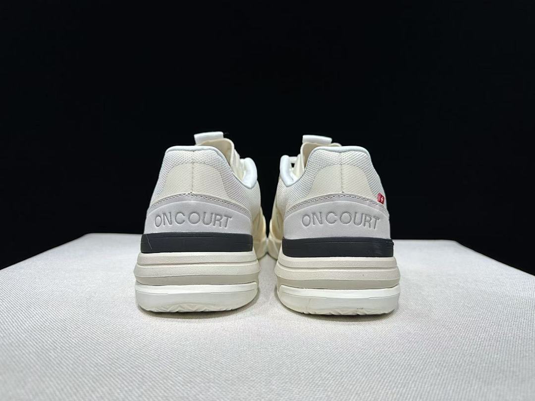 Cream and Black On The Roger Advantage Pro Sneakers - product image from the listing.