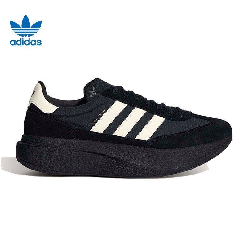 adidas Sneakers in Black and White - product image from the listing.