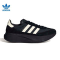 adidas Sneakers in Black and White - product image from the listing.