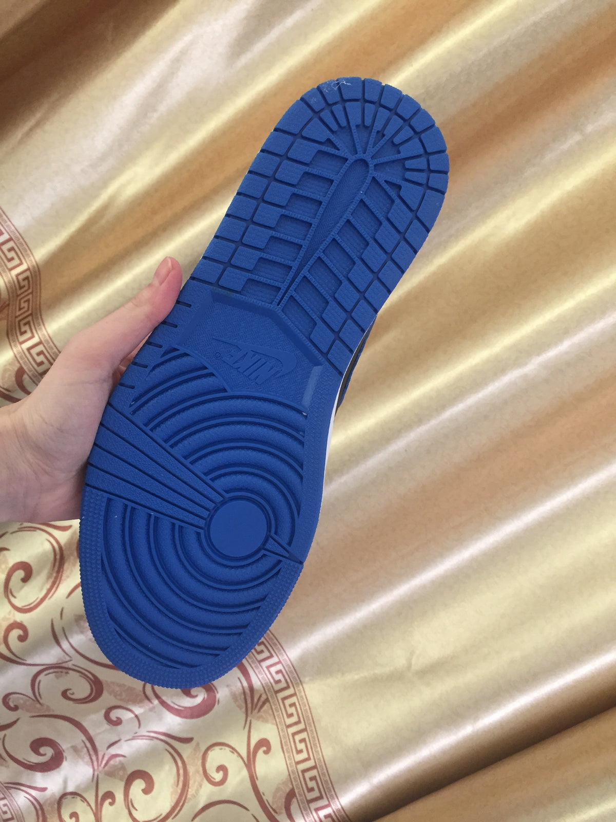 Jordan 1 High Sneakers in Black and Royal Blue - product image from the listing.
