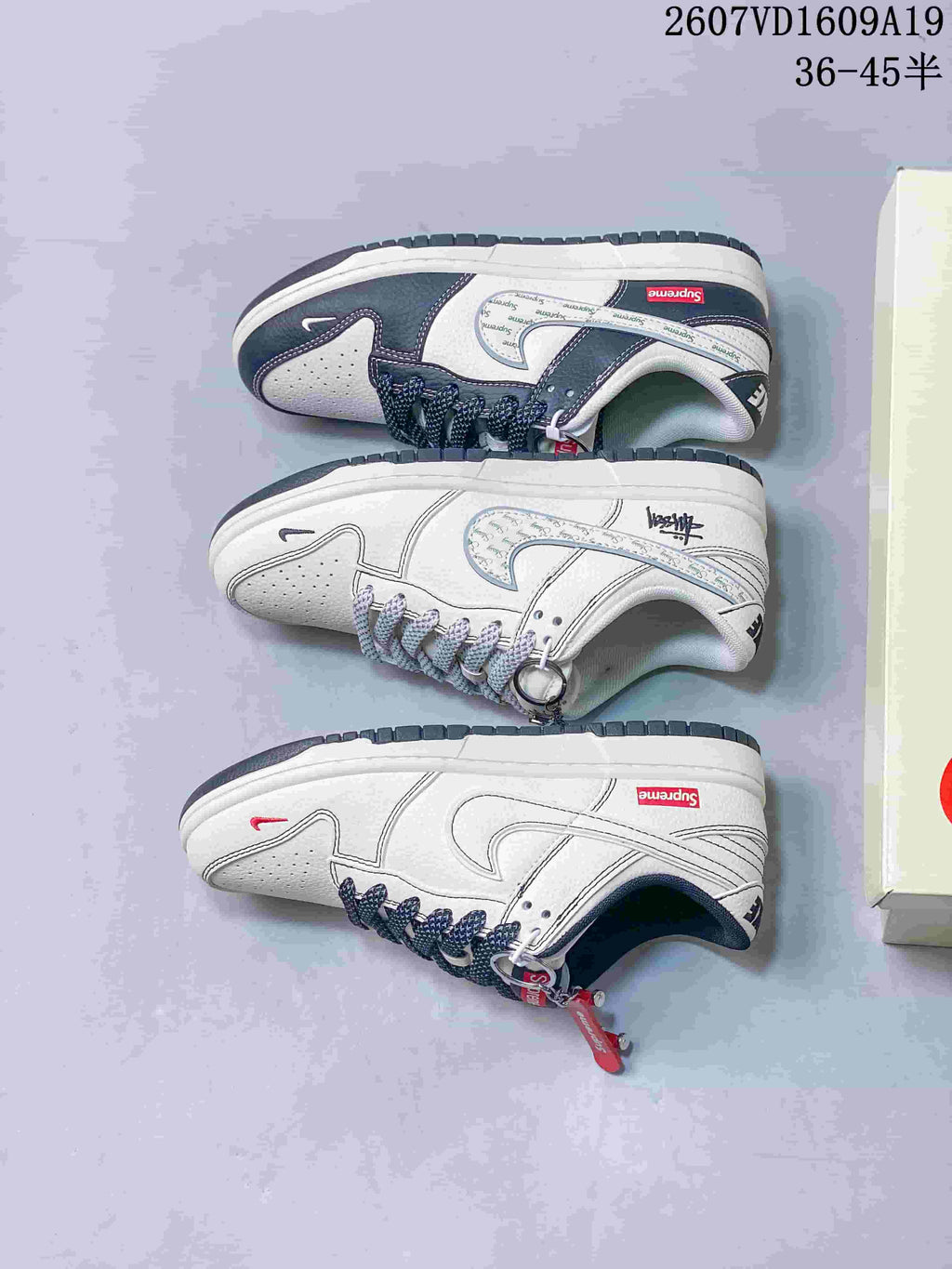 Nike Dunk Low Retro Custom Sneakers in White and Navy - product image from the listing.