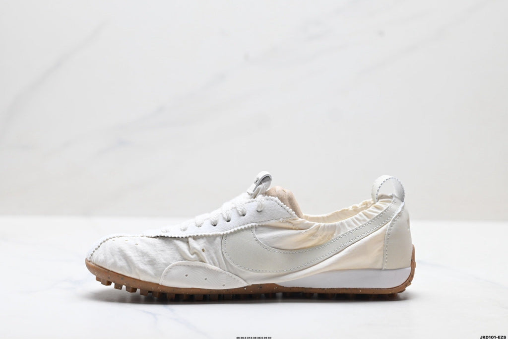 White Jacquemus x Nike Jacumoon Sneakers - product image from the listing.
