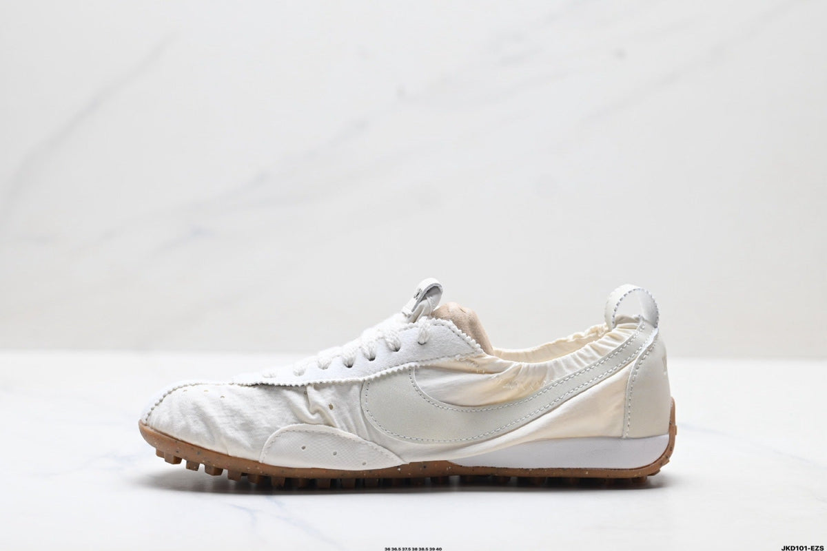 White Jacquemus x Nike Jacumoon Sneakers - product image from the listing.