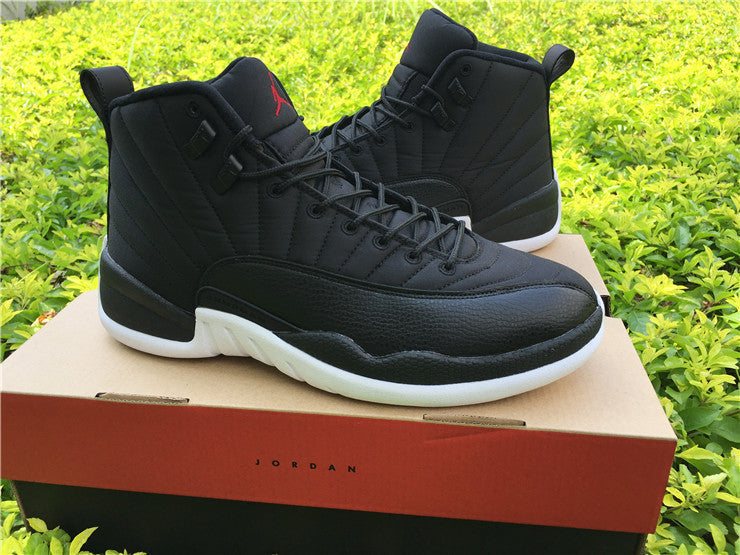 Air Jordan 12 Black Nylon High-Top Sneakers - product image from the listing.