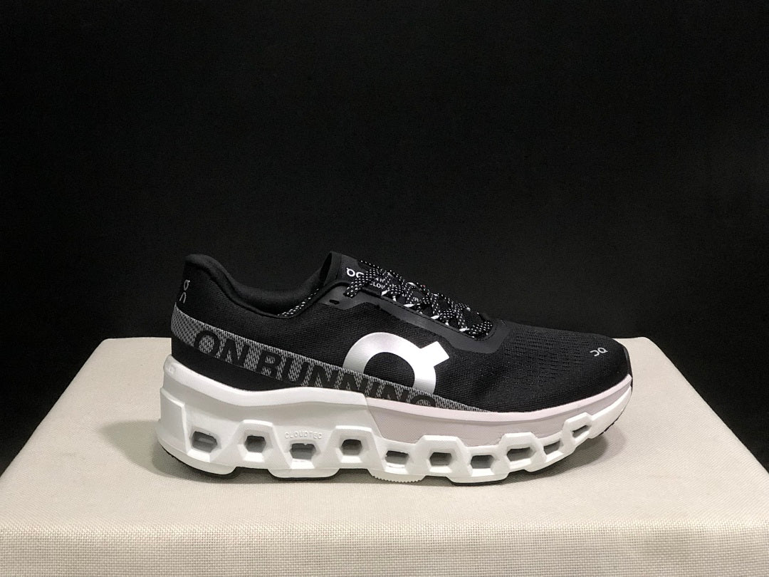 On Cloudmonster 2 Running Shoes in Black White - product image from the listing.