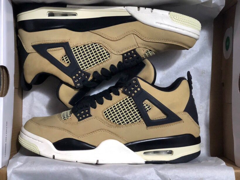 Jordan 4 Retro Sneakers in Tan Black - product image from the listing.