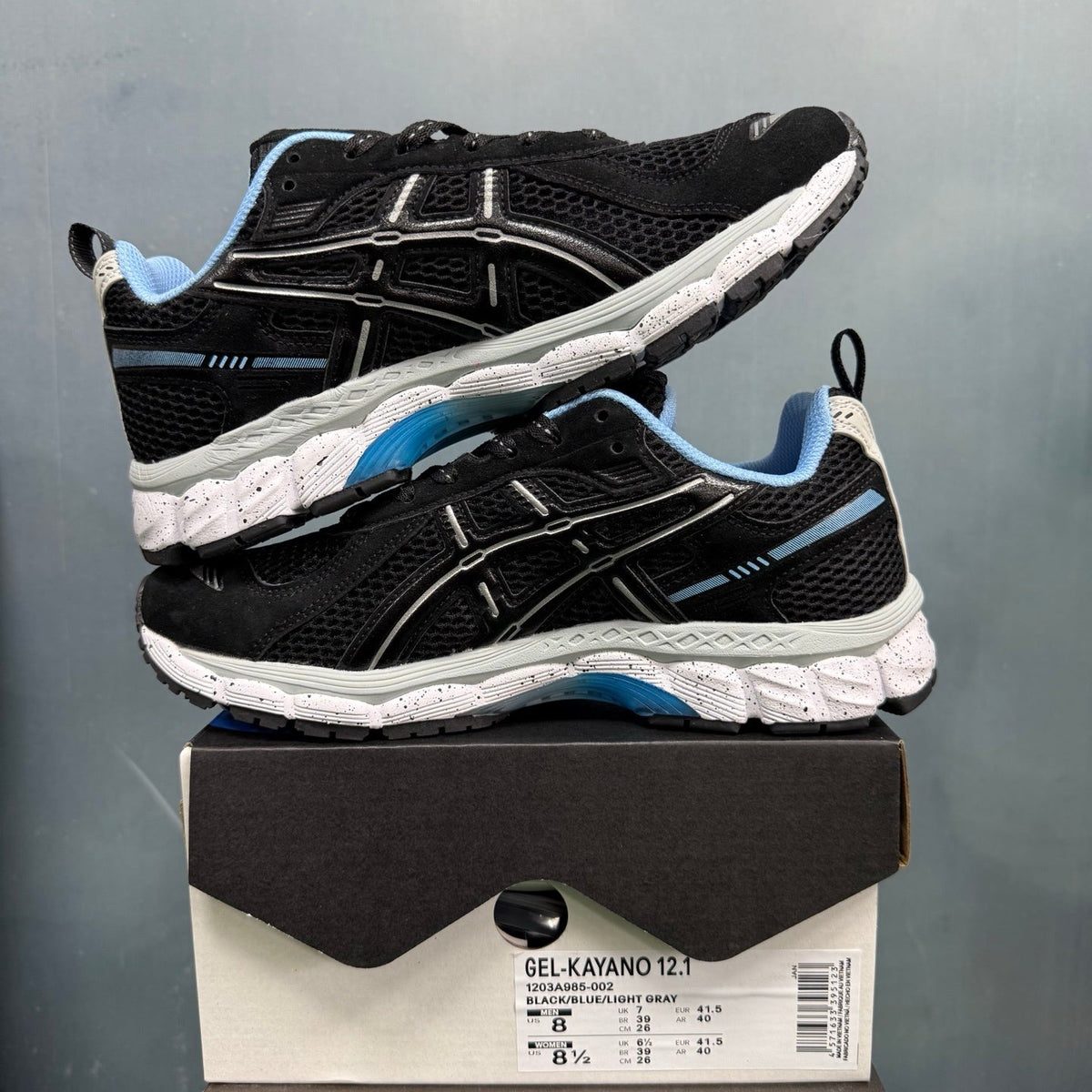 ASICS GEL-KAYANO 12.1 Running Sneakers in Black Blue - product image from the listing.