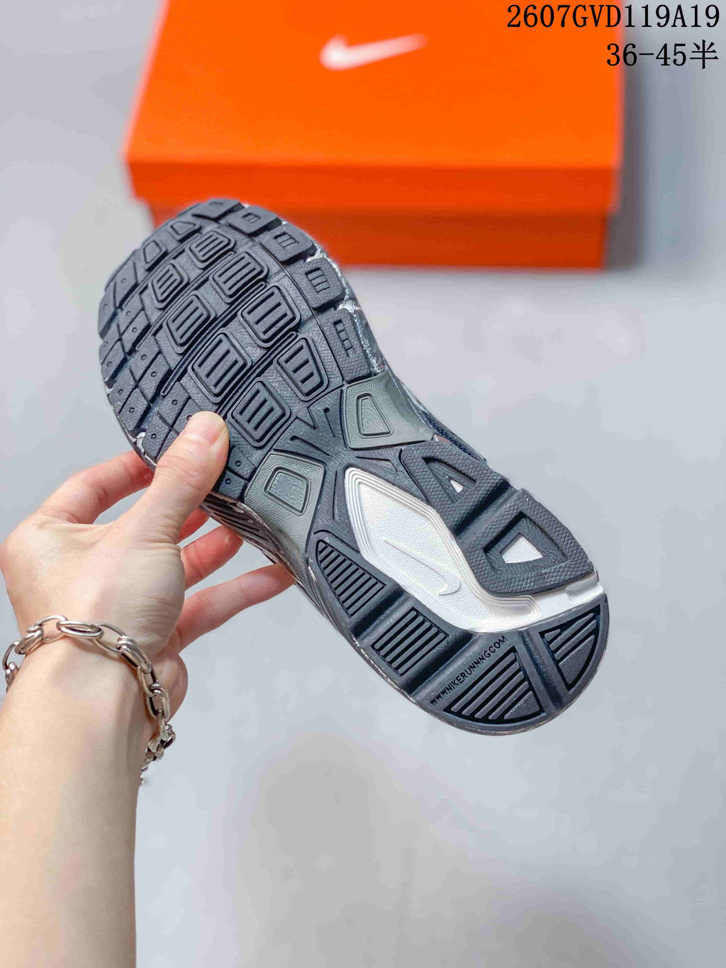Nike Initiator Sneakers in Black and Grey - product image from the listing.