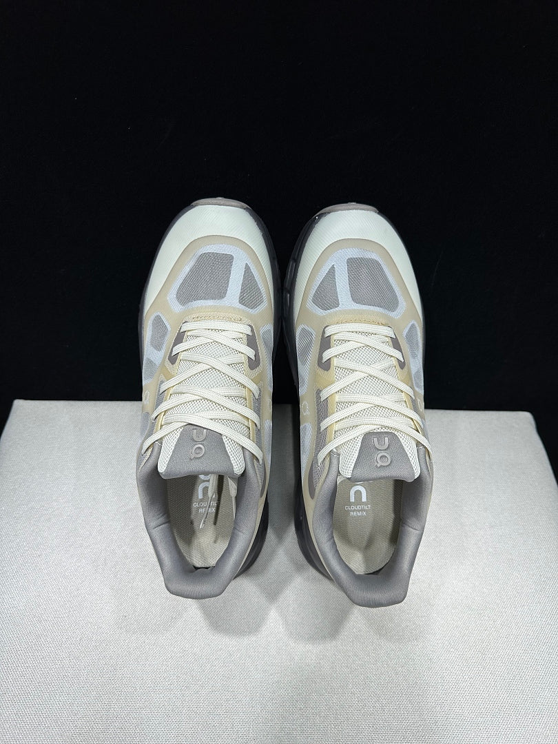 On Cloudtilt Remix Trainers in White and Pebble - product image from the listing.