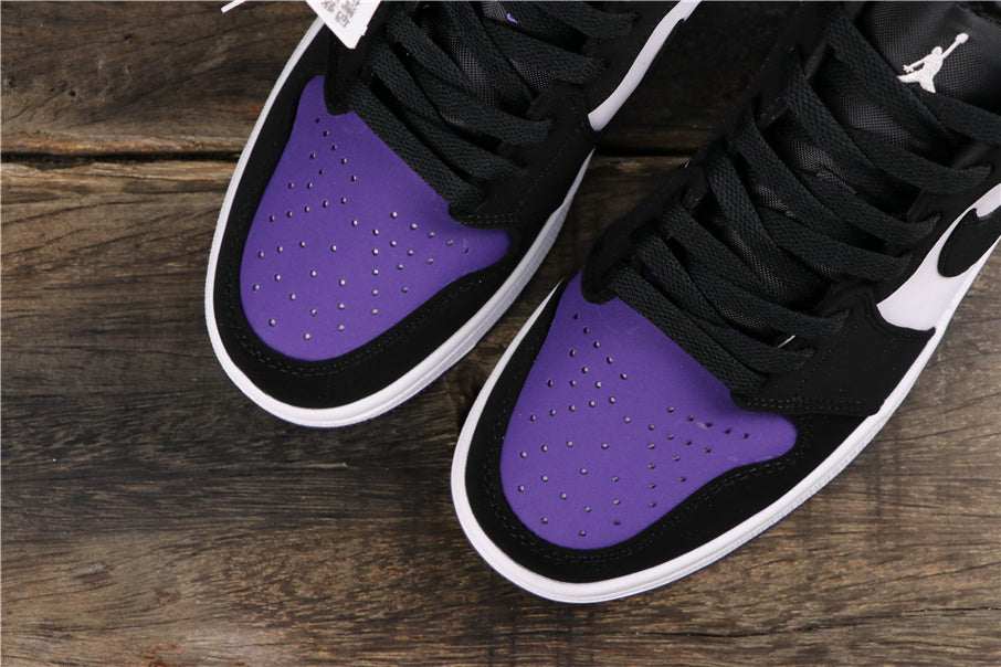 Air Jordan 1 Low Sneakers in White Black Orange Purple 553558-125 - product image from the listing.