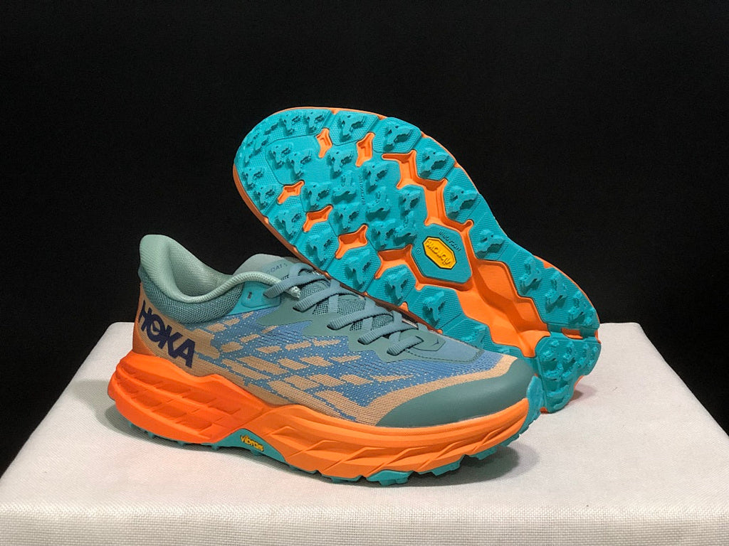 HOKA Speedgoat 5 Trail Running Shoes in Blue Orange - product image from the listing.