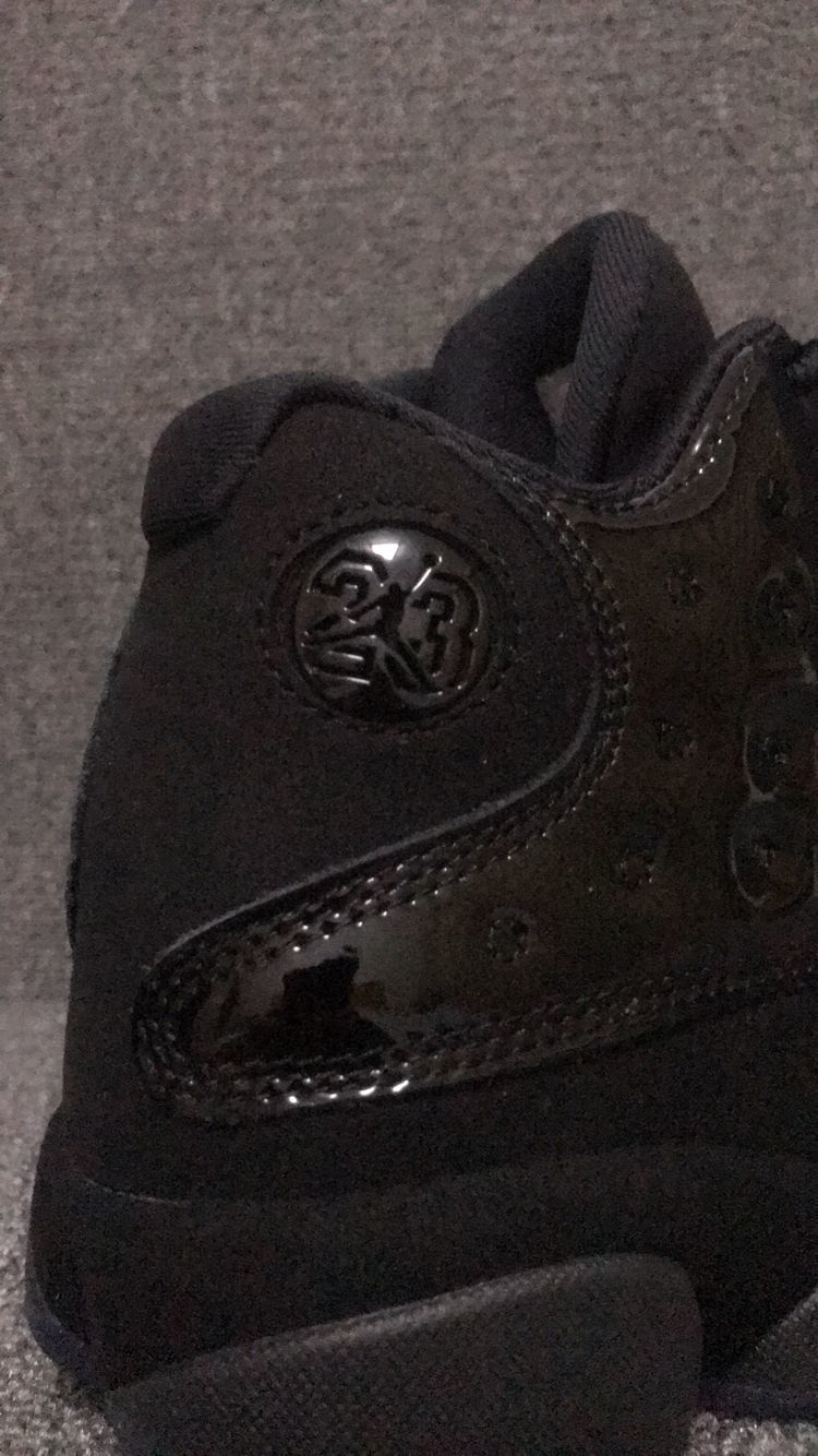 Air Jordan 13 Retro Cap and Gown Sneakers in Black - product image from the listing.