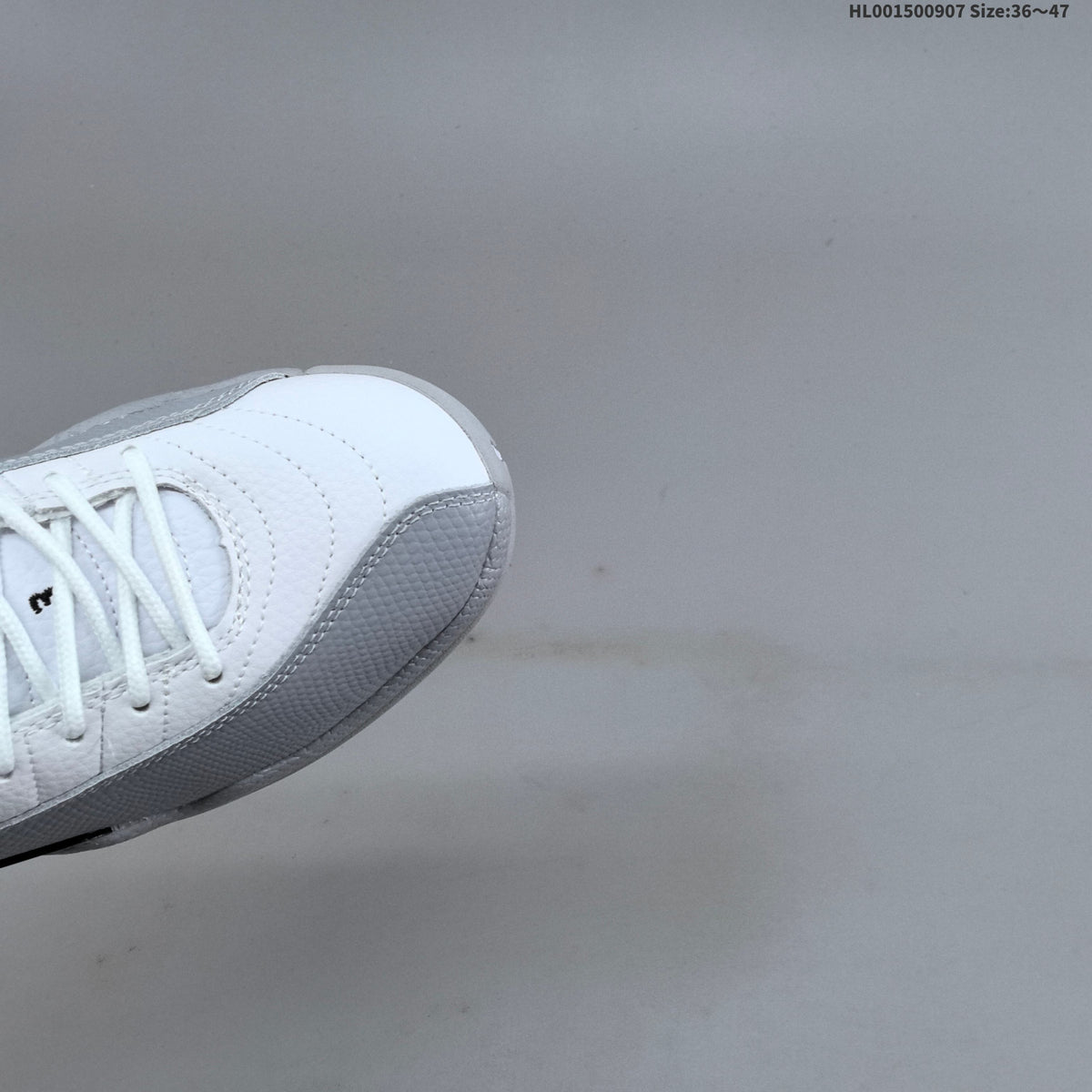 Air Jordan 12 Retro High Barons White Grey Sneakers - product image from the listing.